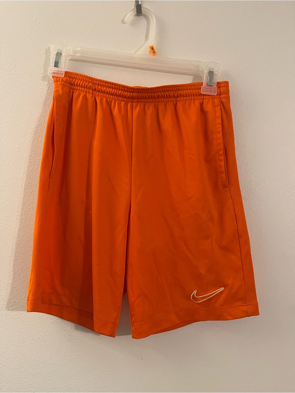 Nike Girl's Bright Orange Athletic Shorts with White Swoosh